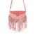 Wild West Fringe Leather Crossbody Bag in Pink. Pink suede handbag with fringe on a white background