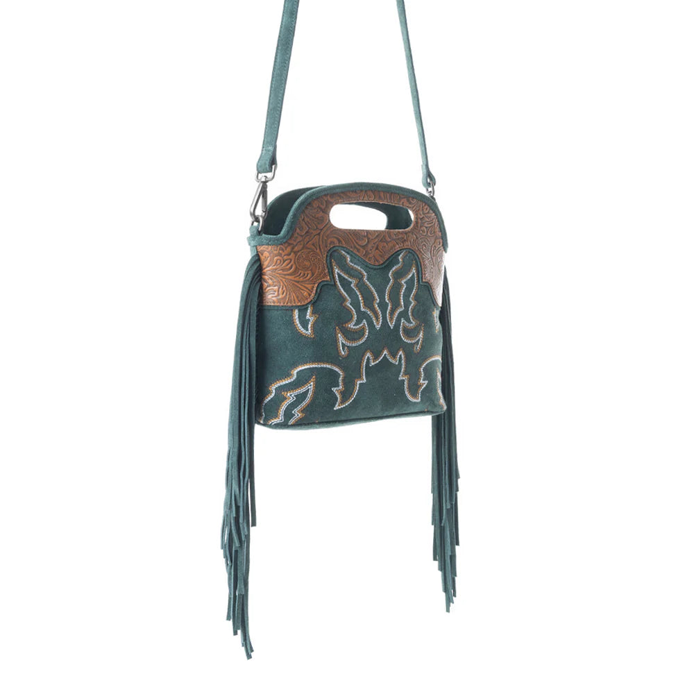 Electric Dessert Shoulder Bag In Green. Green handbag with brown leather accents and fringe on a white background