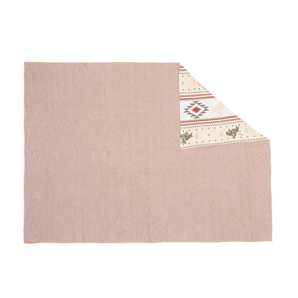 Starstone Throw. Patterned fabric with tribal design on a white background