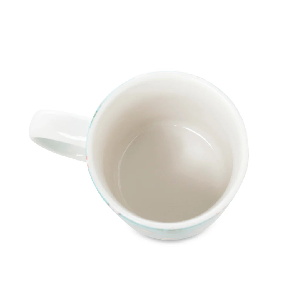 Sippin’ in the South Ceramic Mug in Cactus Geometry. White ceramic mug with a handle on a white background