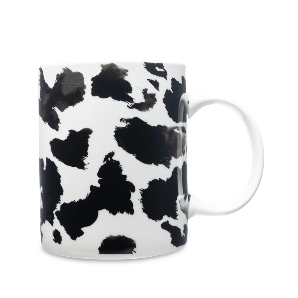 Sippin’ in the South Ceramic Mug in Black Leopard Print. White mug with black abstract pattern on a white background