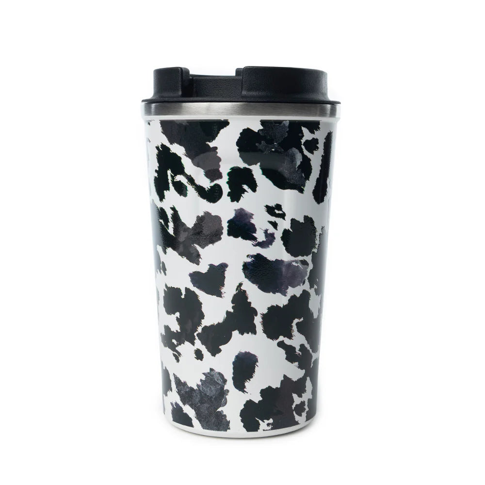 Western Trail Brew Stainless Steel Mug in Black Leopard Print. Travel mug with black and white cow print pattern on a white background