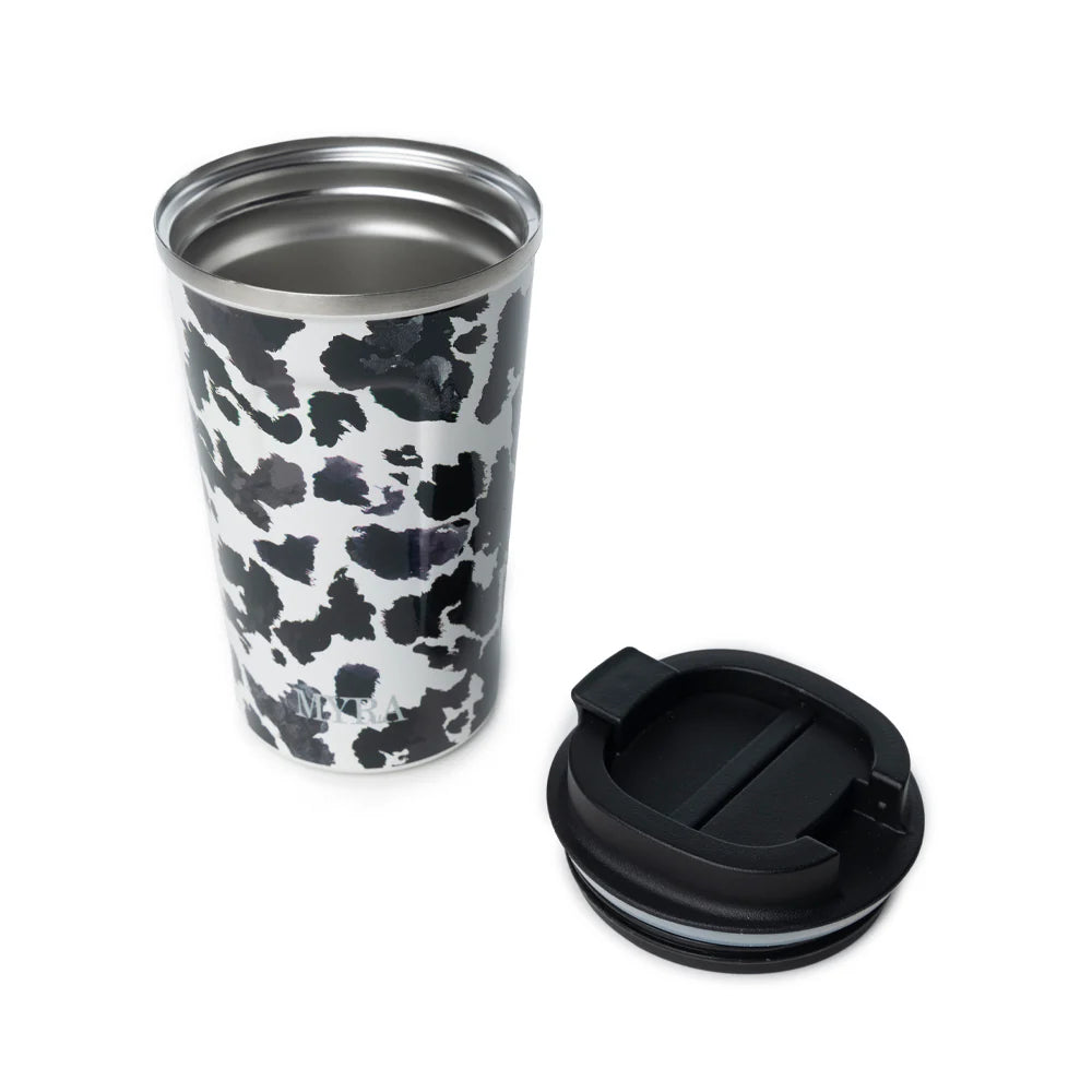 Western Trail Brew Stainless Steel Mug in Black Leopard Print. Cow print travel mug with a black lid on a white background