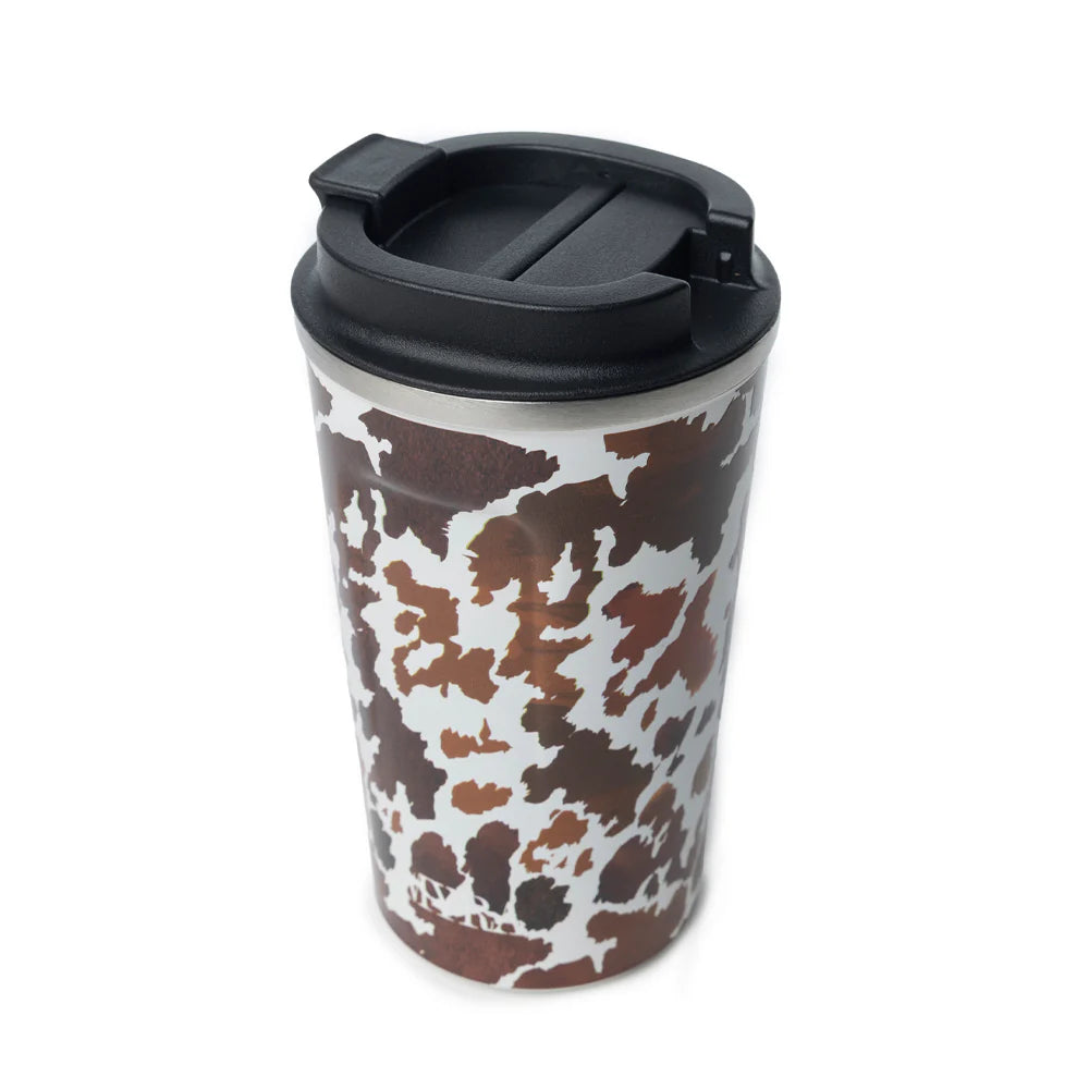 Western Trail Brew Stainless Steel Mug in Brown Leapard Print. Travel mug with cow print design and black lid on a white background