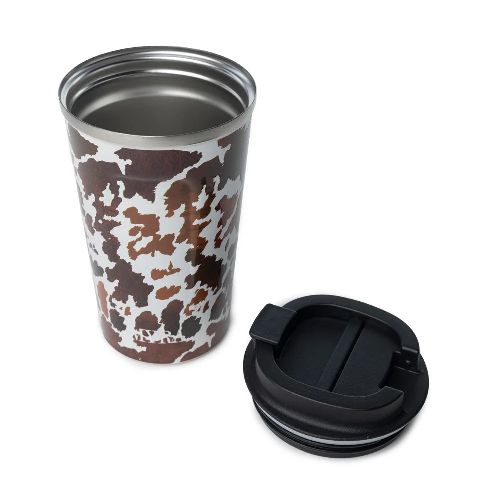 Western Trail Brew Stainless Steel Mug in Brown Leapard Print. Stainless steel tumbler with cow print design and black lid on a white background