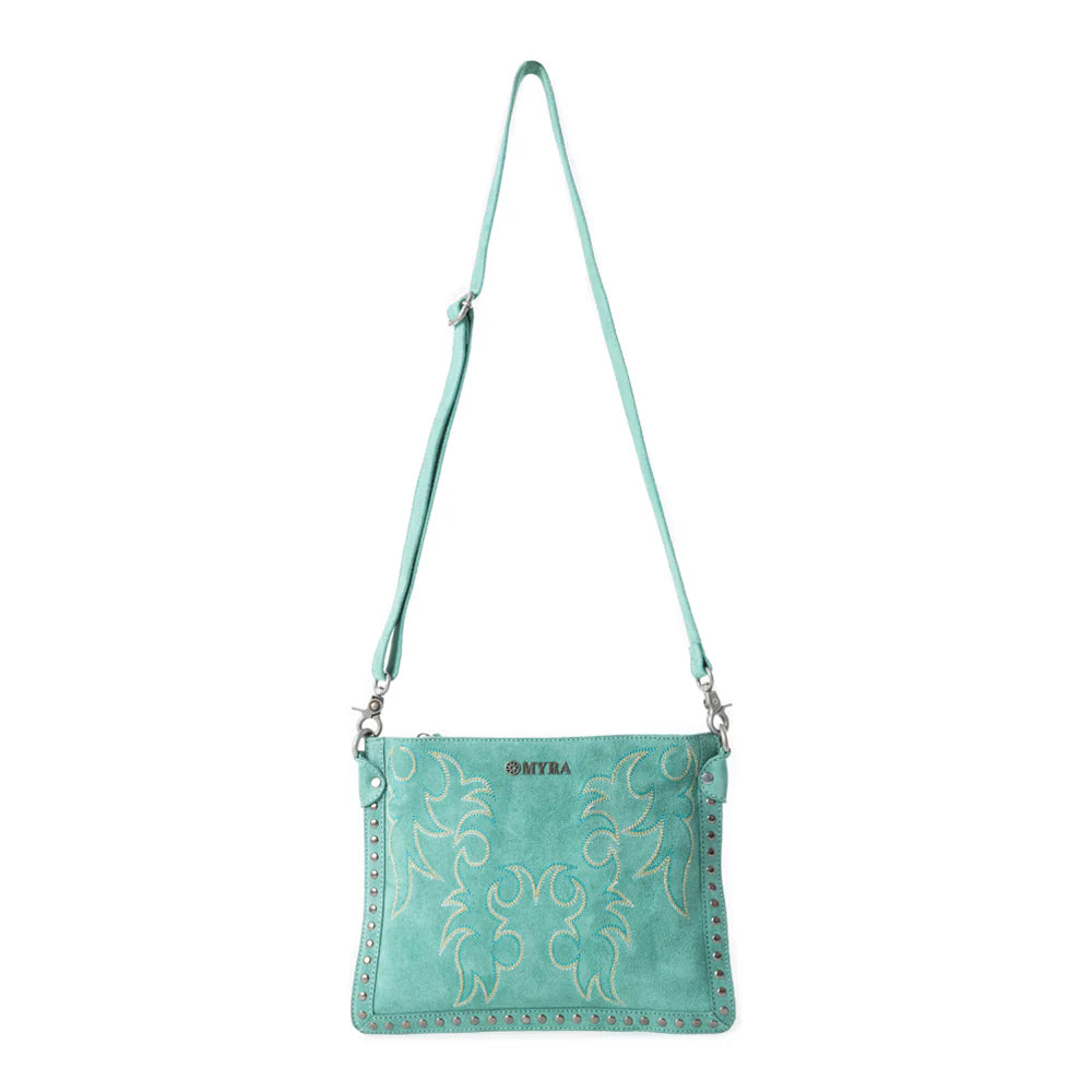 Texas Rose Western Embroidered Leather Bag in Turquoise. Teal crossbody bag with floral embroidery on a white background