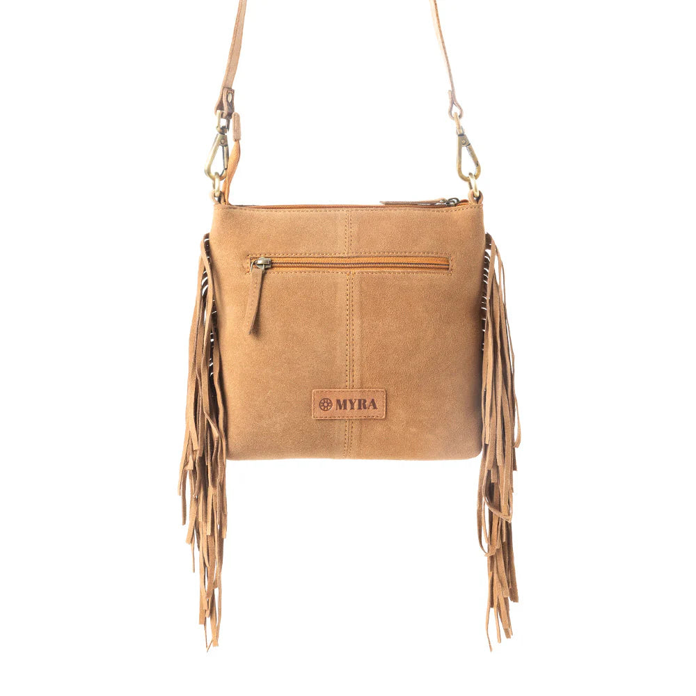 Sonora Charm Handtooled Bag in Brown & White. Brown leather handbag with fringe details on a white background