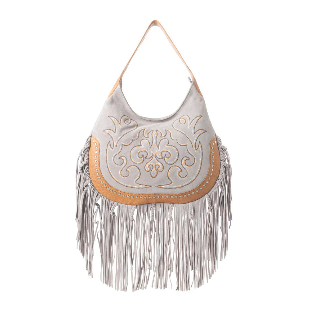 Sage Whisper Fringe Leather Bag in Pearl White. Gray handbag with beige fringe and intricate design on a white background