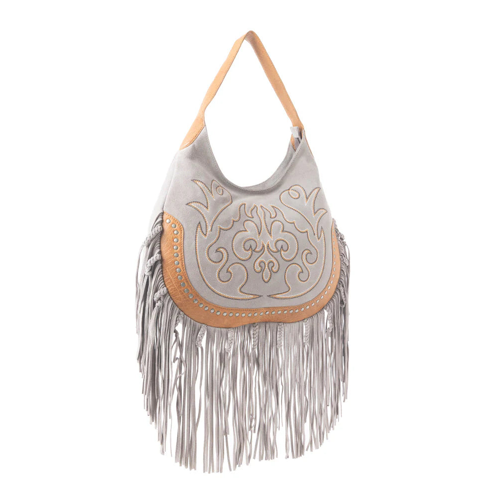 Sage Whisper Fringe Leather Bag in Pearl White. Gray handbag with beige fringe and intricate design on a white background
