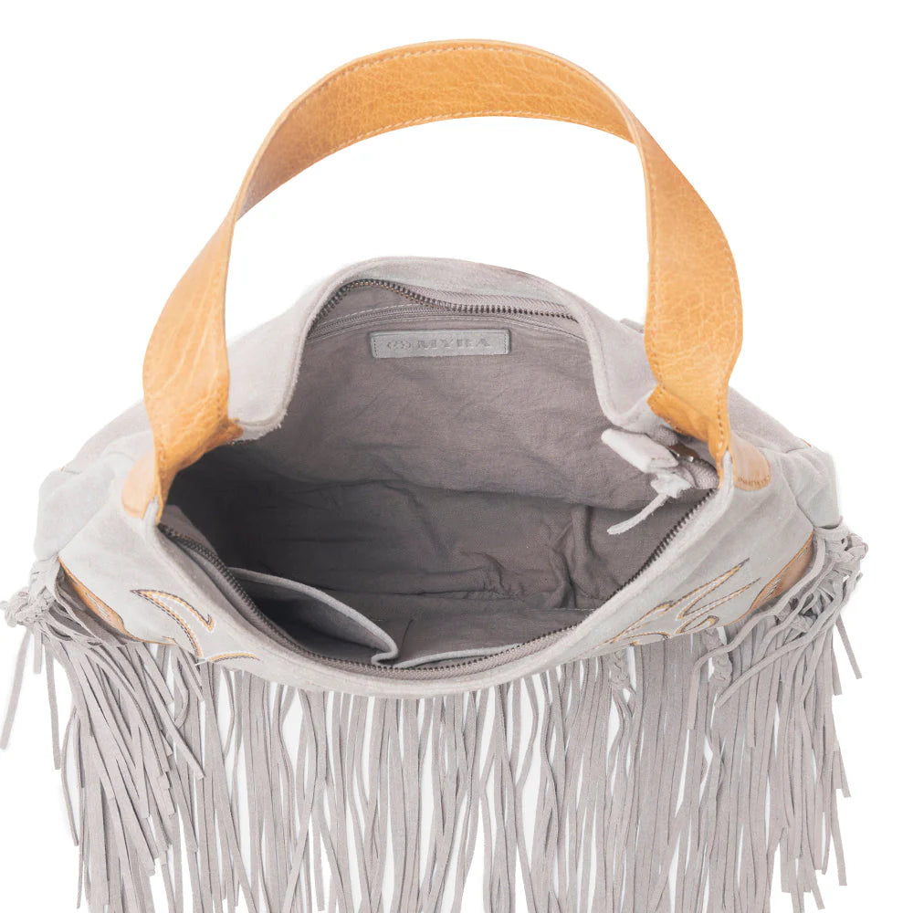 Sage Whisper Fringe Leather Bag in Pearl White. Gray handbag with yellow handle and fringe details on a white background