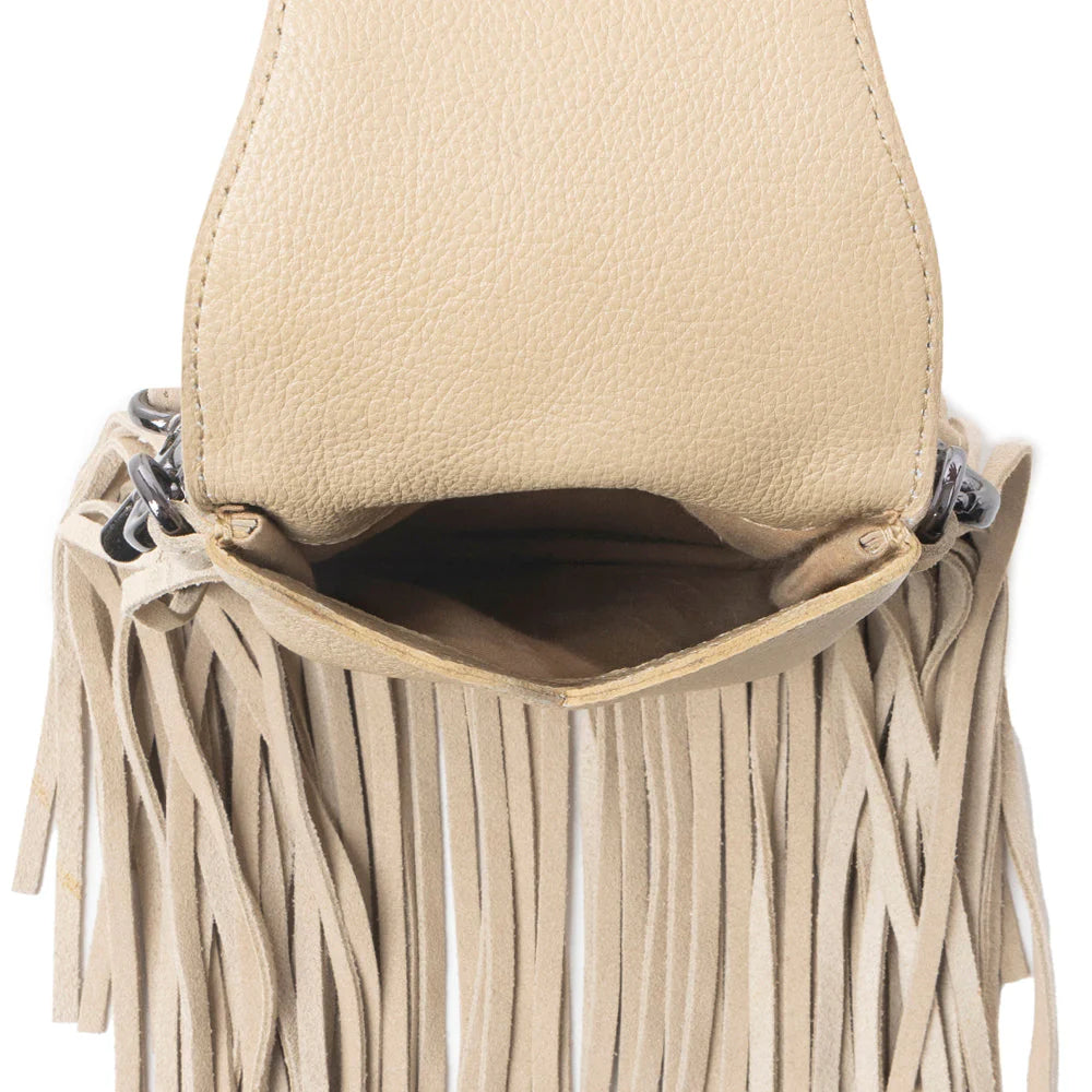 Whispering Totem Leather Western Handbag in Nomad Ivory. Beige leather handbag with fringe details on a white background