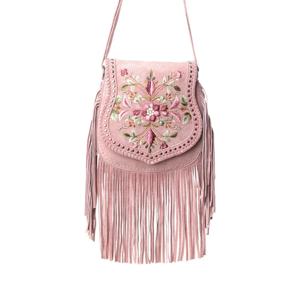 Pink fringe bag with floral embroidery on a white background