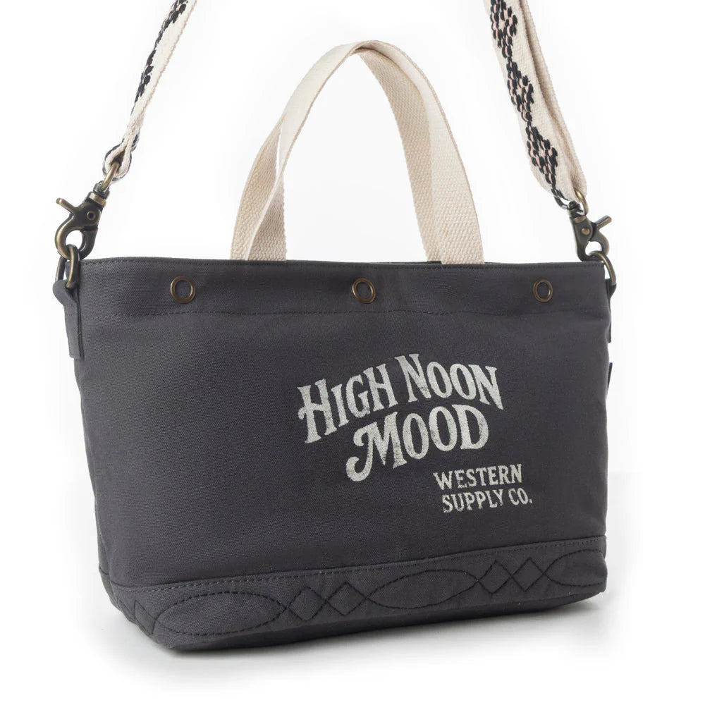 Black tote bag with 'High Noon Mood' text on a white background