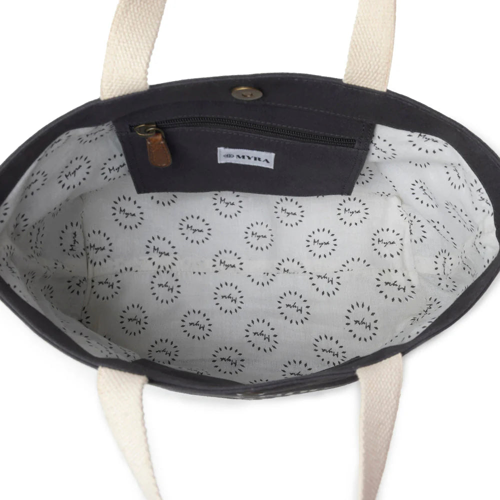 Bag with patterned interior and visible brand logo on a white background