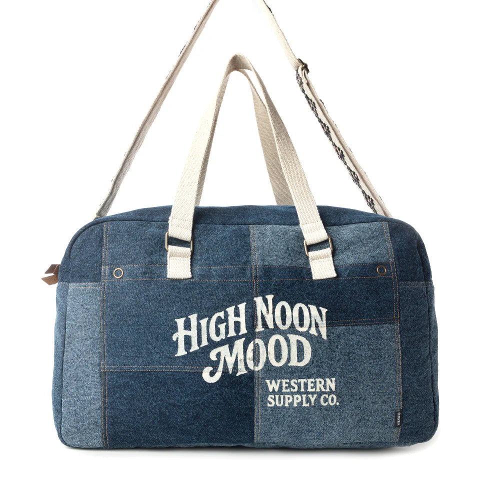 Denim duffel bag with 'High Noon Mood' text on a white background