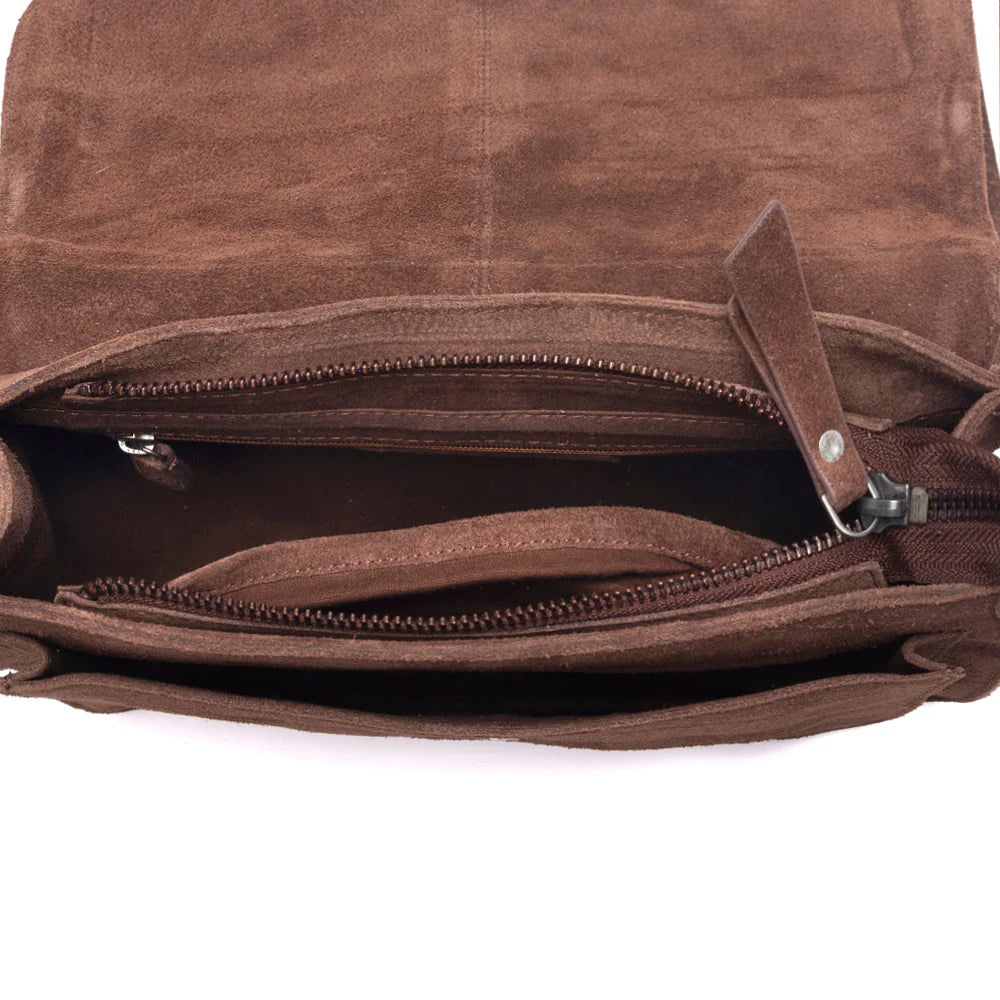 Brown leather bag with zippers on a white background