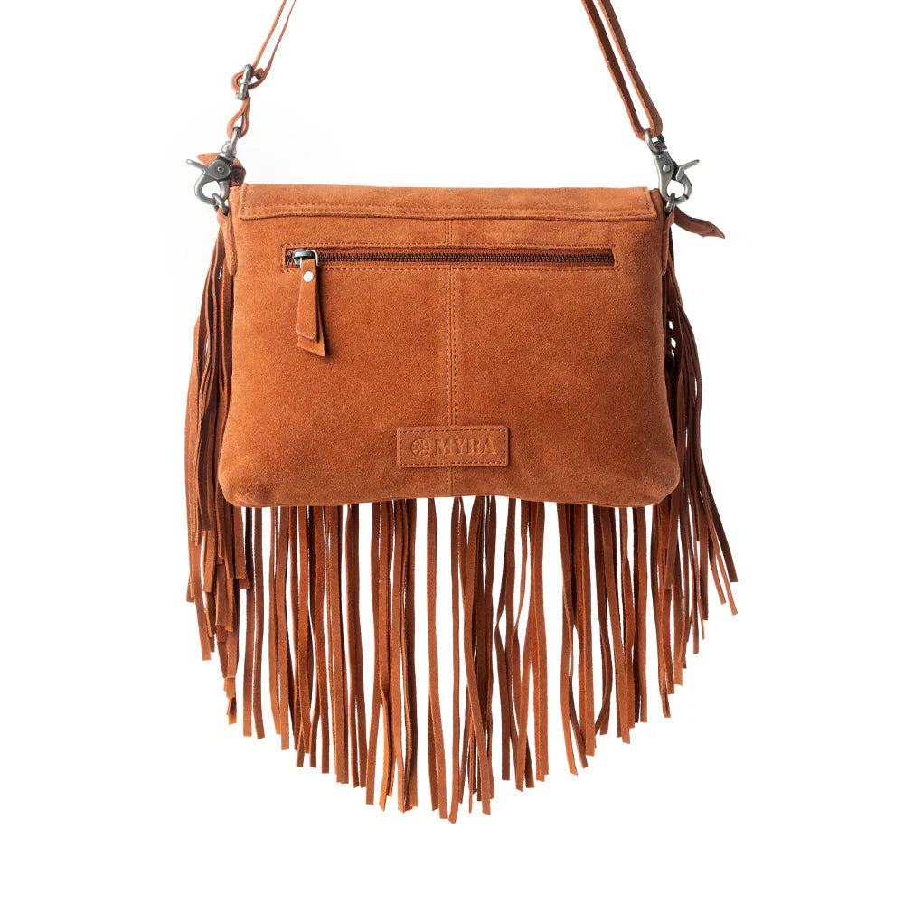 Brown suede handbag with fringe on a white background
