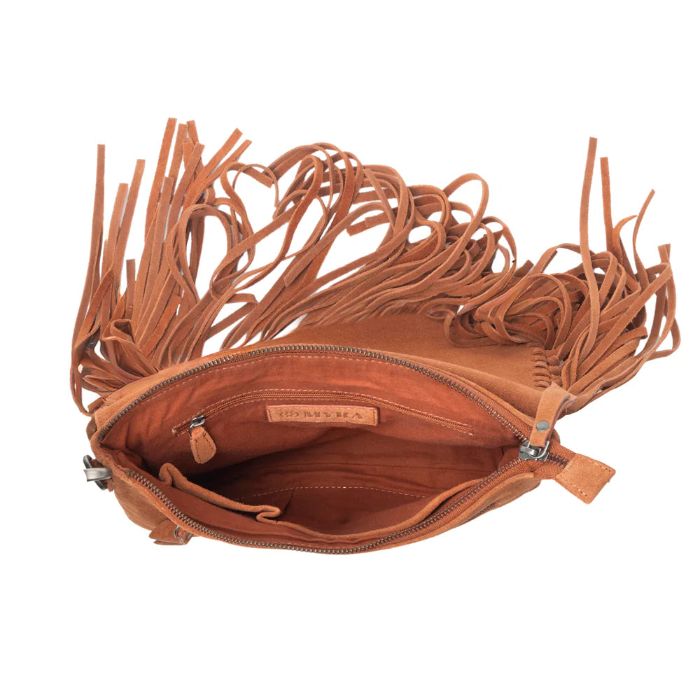 Brown leather handbag with fringes on a white background
