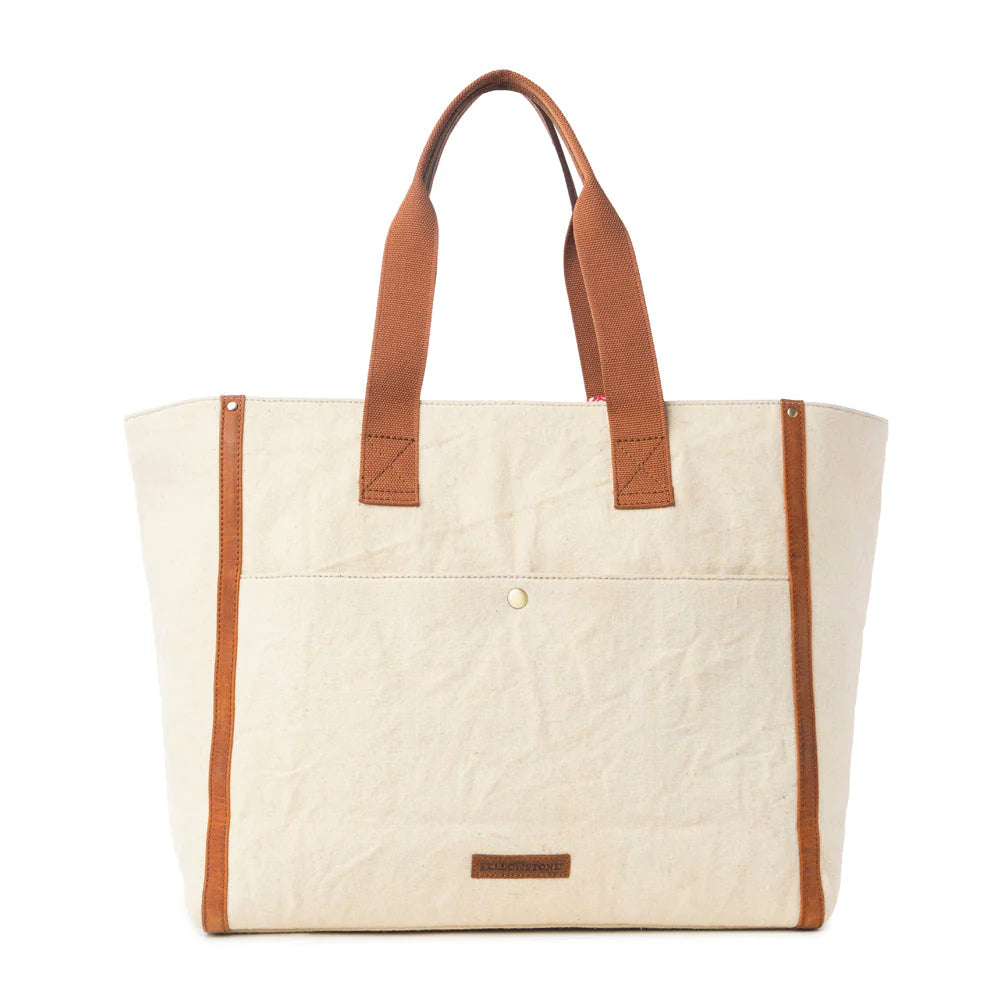 Yellowstone Ivory Creek Weekender Bag with Scarf. Beige tote bag with brown handles and trim on a white background