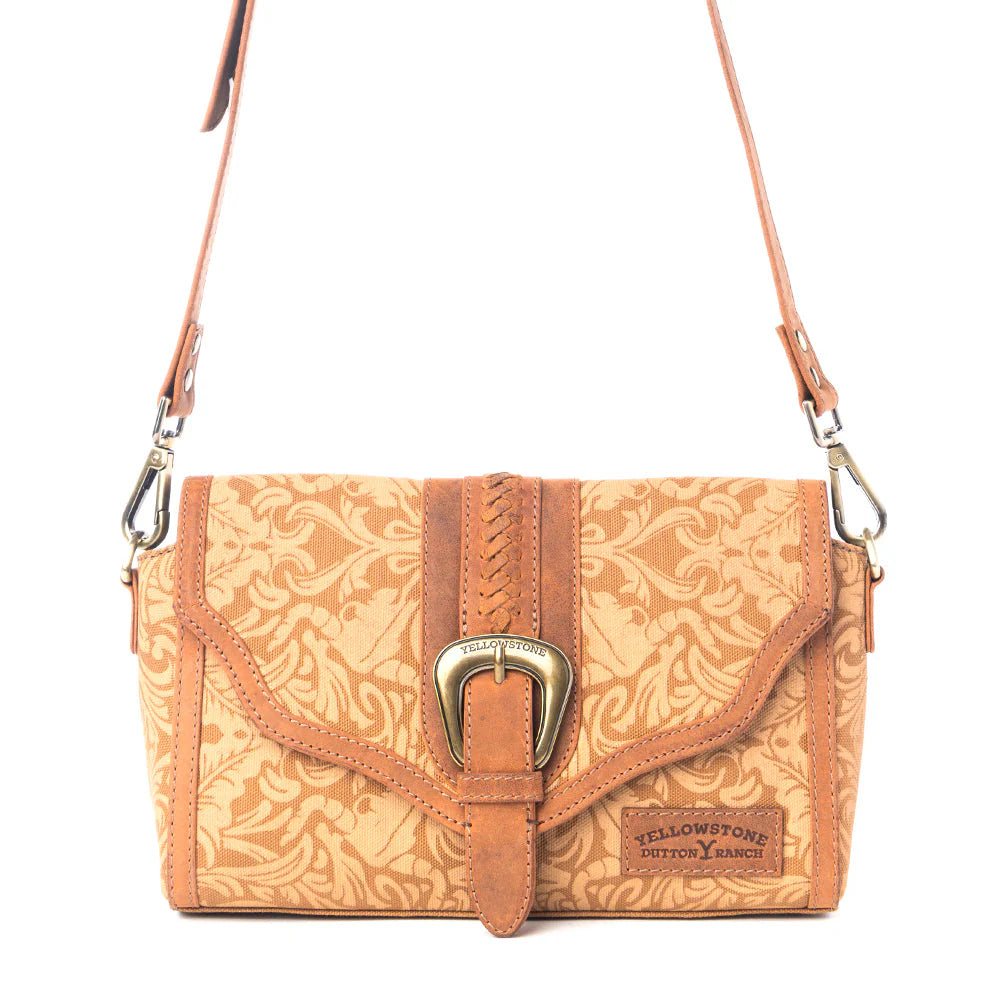 Yellowstone Maverick Sky Crossbody with Buckle in Amber. Patterned handbag with a strap on a white background