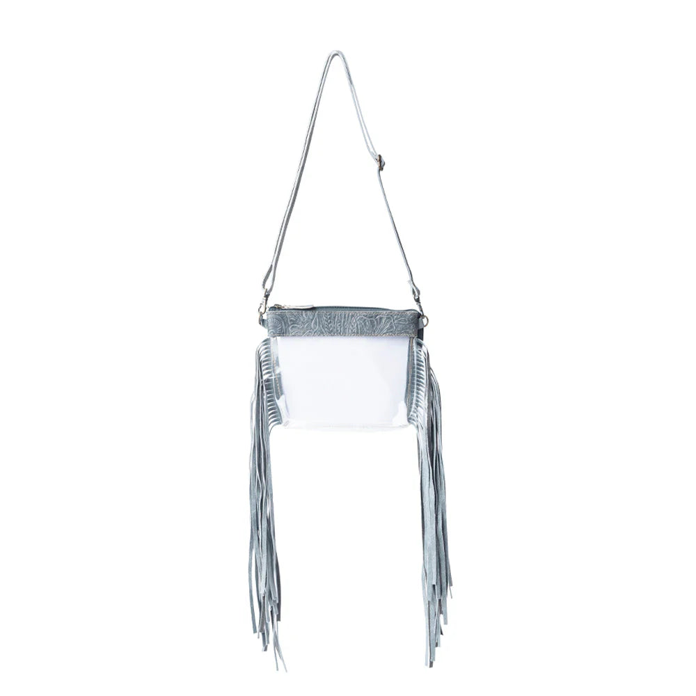 Clear handbag with silver fringe and strap on a white background
