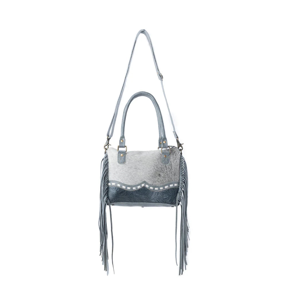 Gray handbag with fringes on a white background