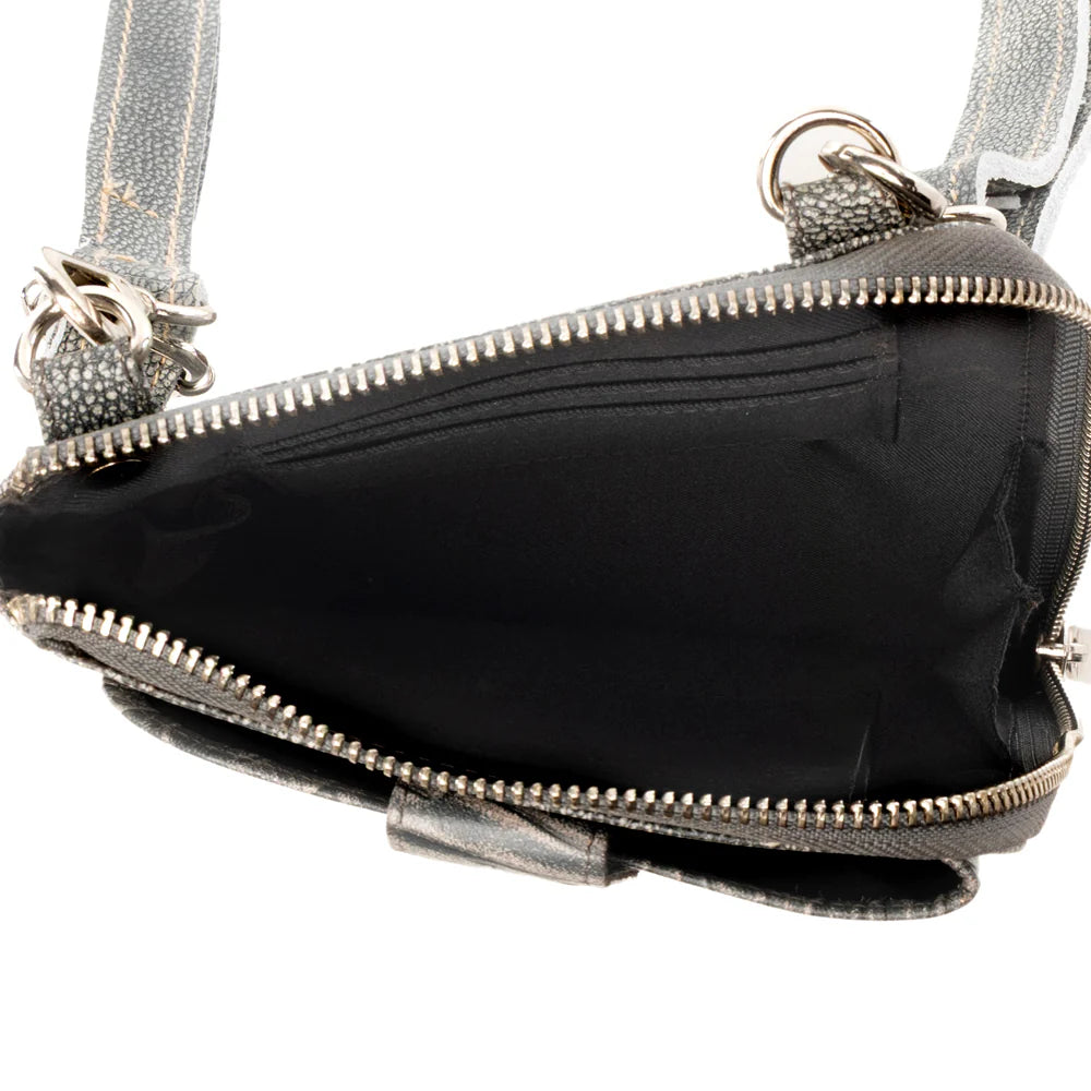 Silver handbag with open zipper showing black interior on a white background