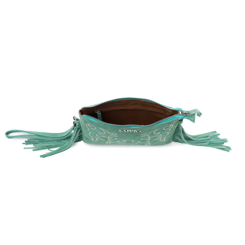 Turquoise clutch with tassels on a white background