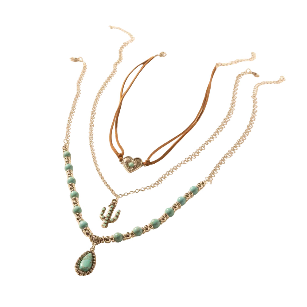 Set of layered necklaces with turquoise beads and cactus charm on a beige background
