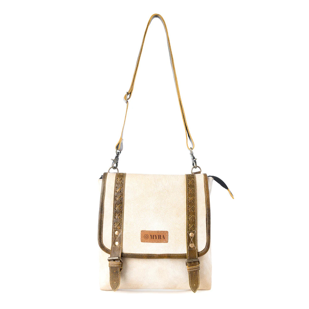 White handbag with brown straps and 'Myra' branding on a white background