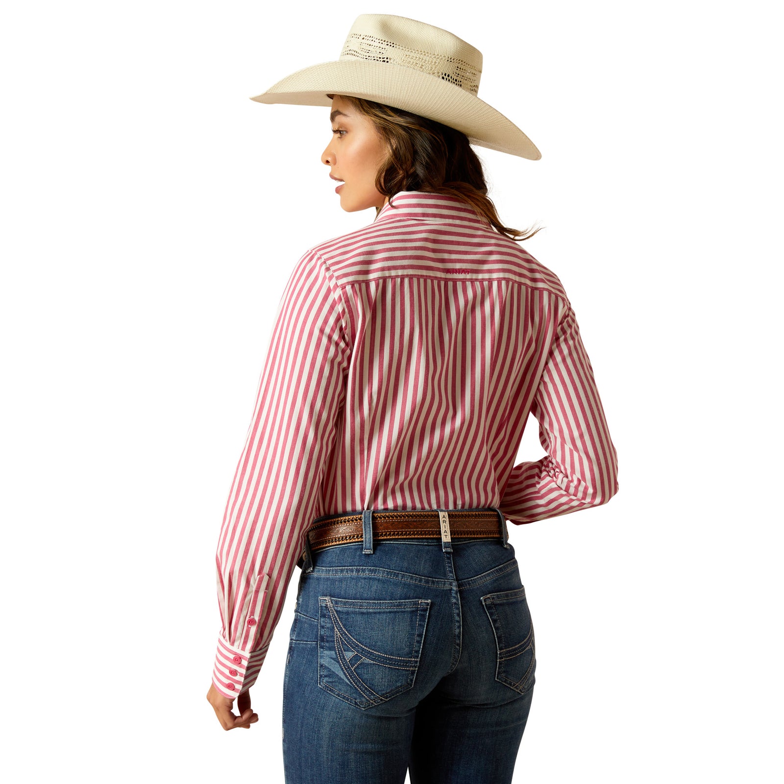 Ariat Women's Kirby L/S Western Shirt. A woman wearing a long-sleeved red and white striped Western shirt with a single chest pocket, tailored for a flattering silhouette.