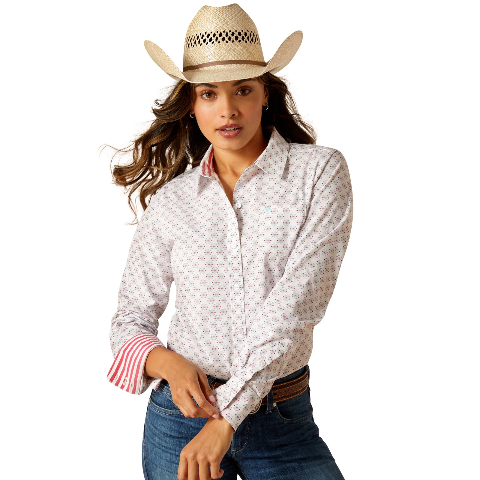 Ariat Women's Kirby L/S Western Shirt. A woman wearing a long-sleeved, geometric patterned Western shirt with a single chest pocket, paired with a cowboy hat.