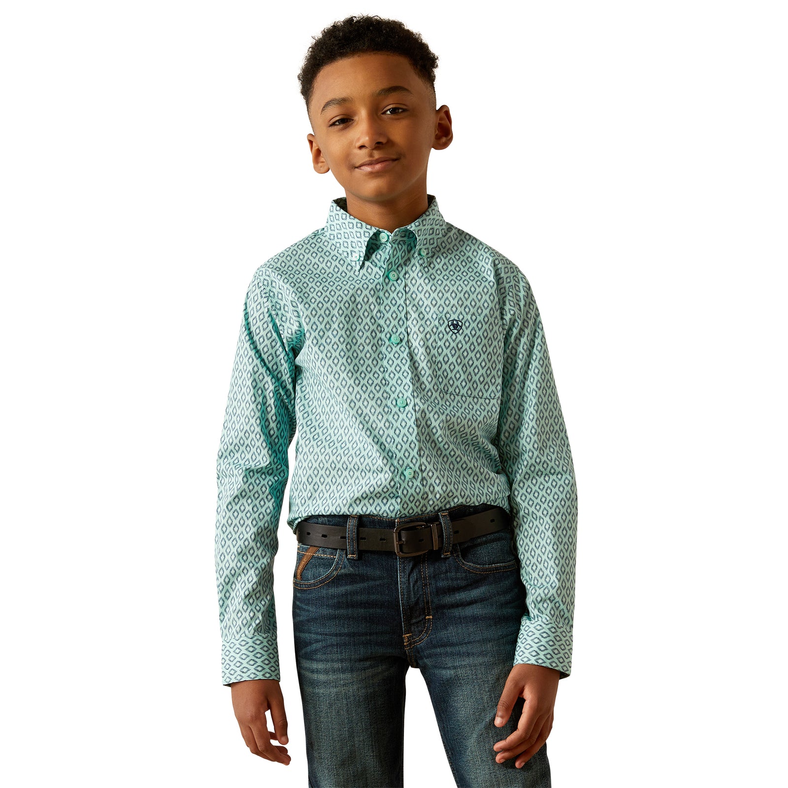 Ariat Boy's Canyon L/S Western Shirt. Young boy wearing a green patterned shirt and jeans on a white background