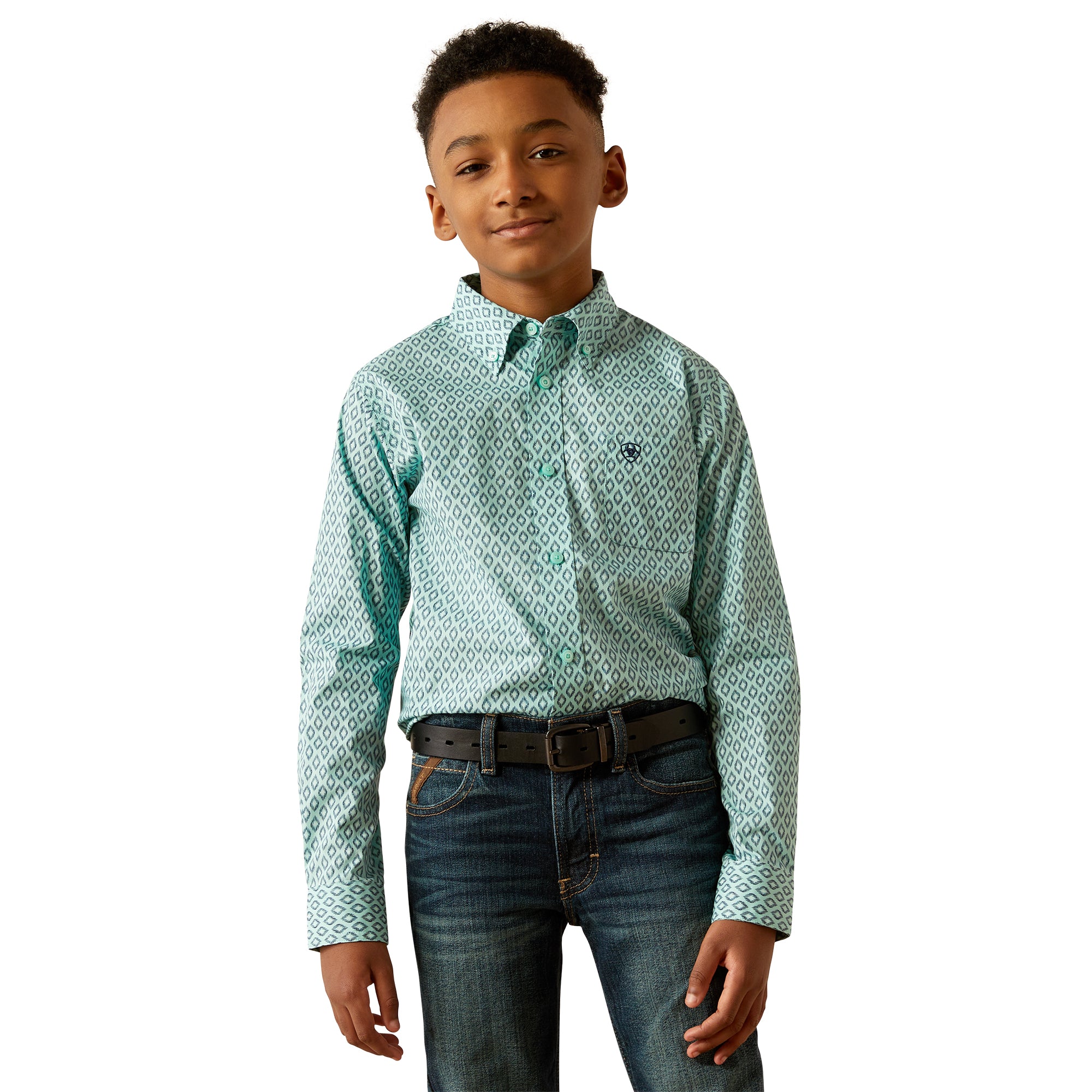 Ariat Boy's Canyon L/S Western Shirt. Young boy wearing a green patterned shirt and jeans on a white background