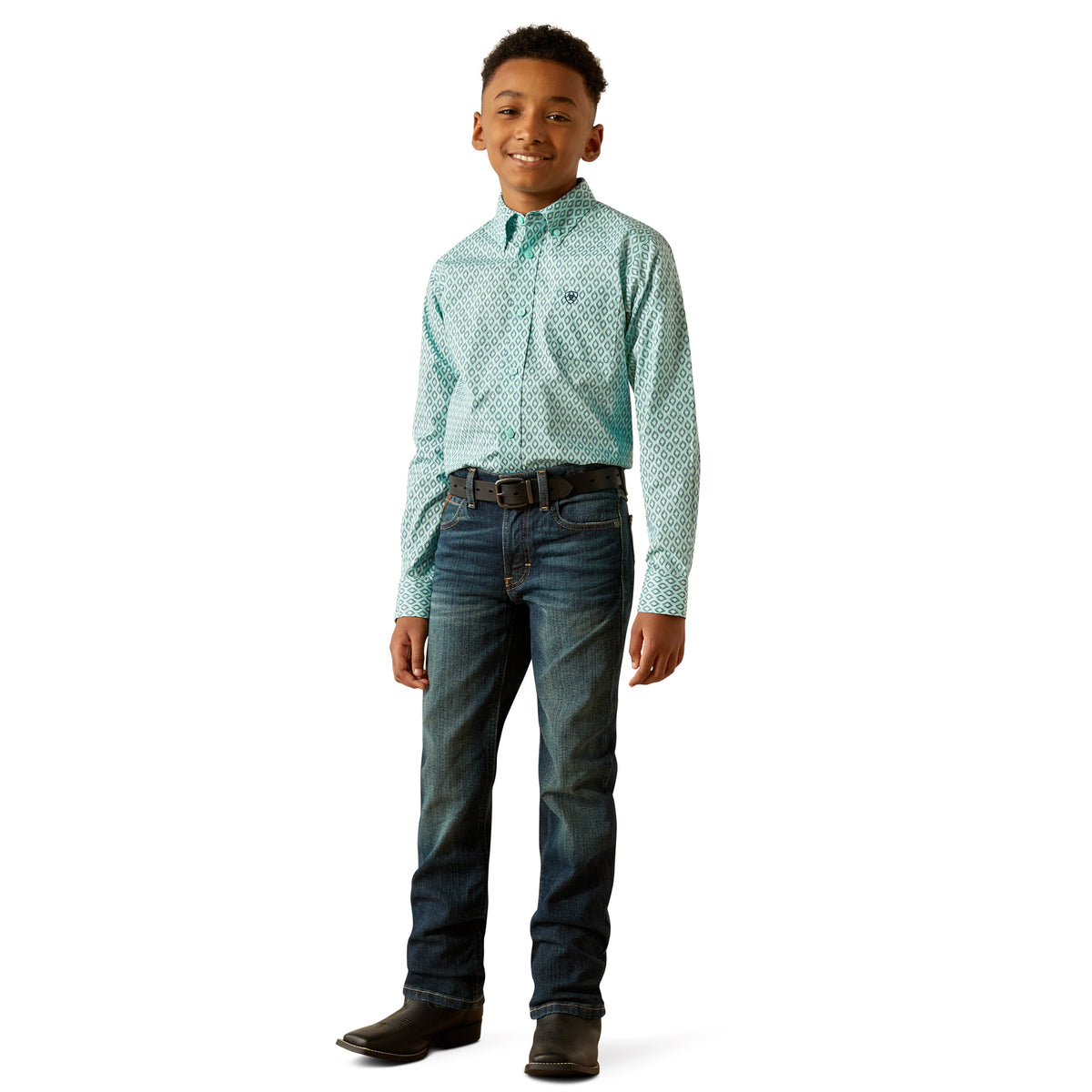 Ariat Boy's Canyon L/S Western Shirt. Young boy wearing a patterned shirt and jeans on a white background
