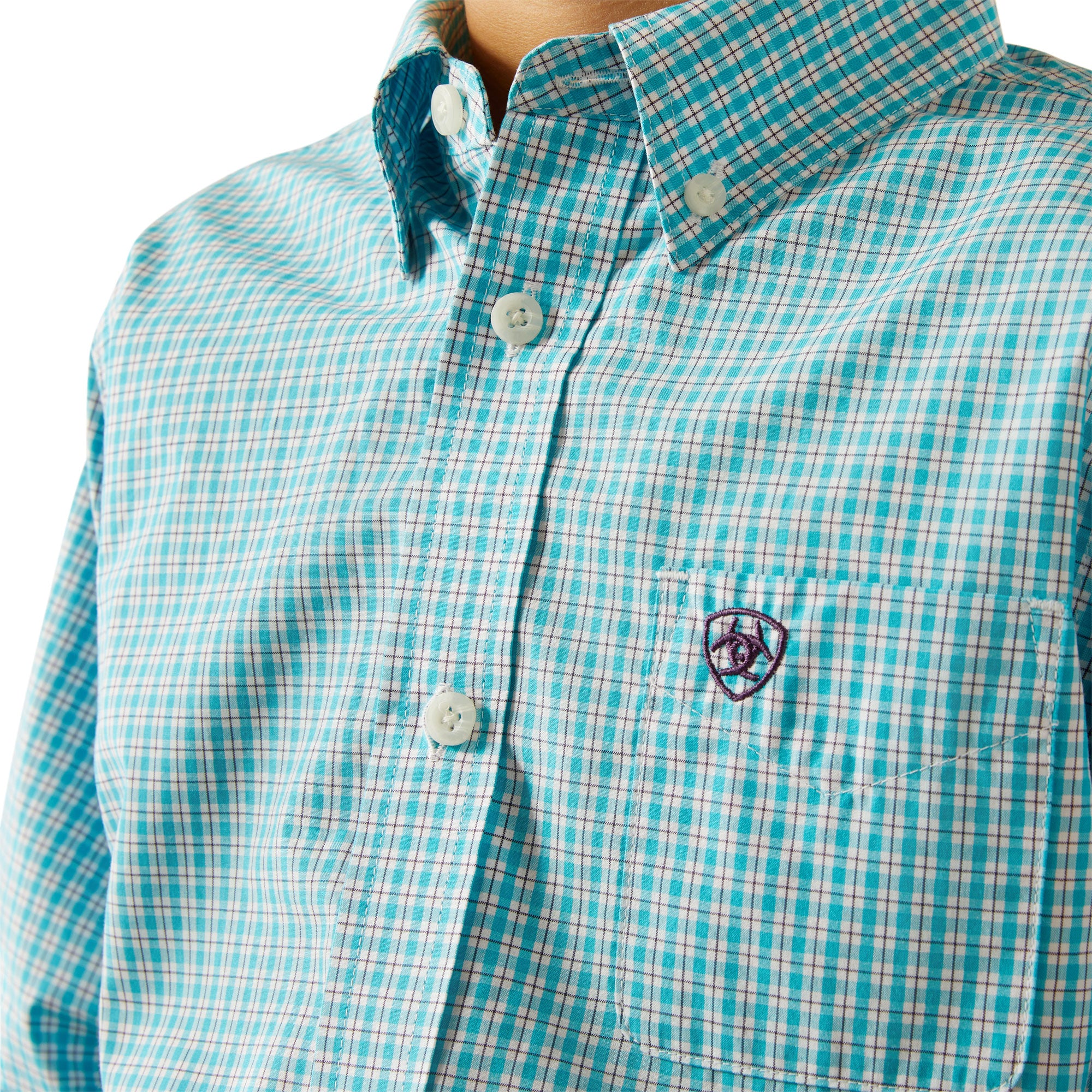 Ariat Boy's Pro Series Wilmer L/S Western Shirt. Close-up of a turquoise and white checkered shirt with a brand logo on a white background
