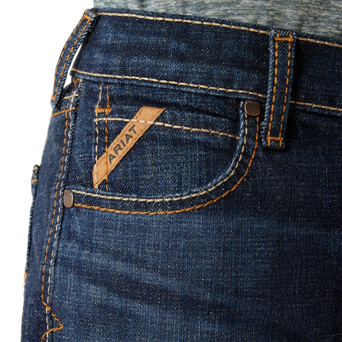 Ariat Boy's B4 Rolland Relaxed Fit Jean. Close-up of blue jeans with Ariat logo on pocket