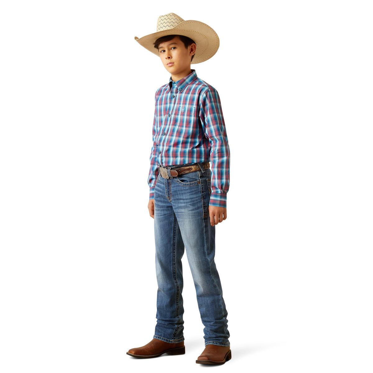 Ariat Boy's B5 Slim Bennet Straight Leg Jean. Young boy wearing a plaid shirt, jeans, and cowboy hat on a white background