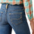 Ariat Girl's Lilla Boot Cut Jeans. Close-up of blue jeans with a plaid shirt on a white background