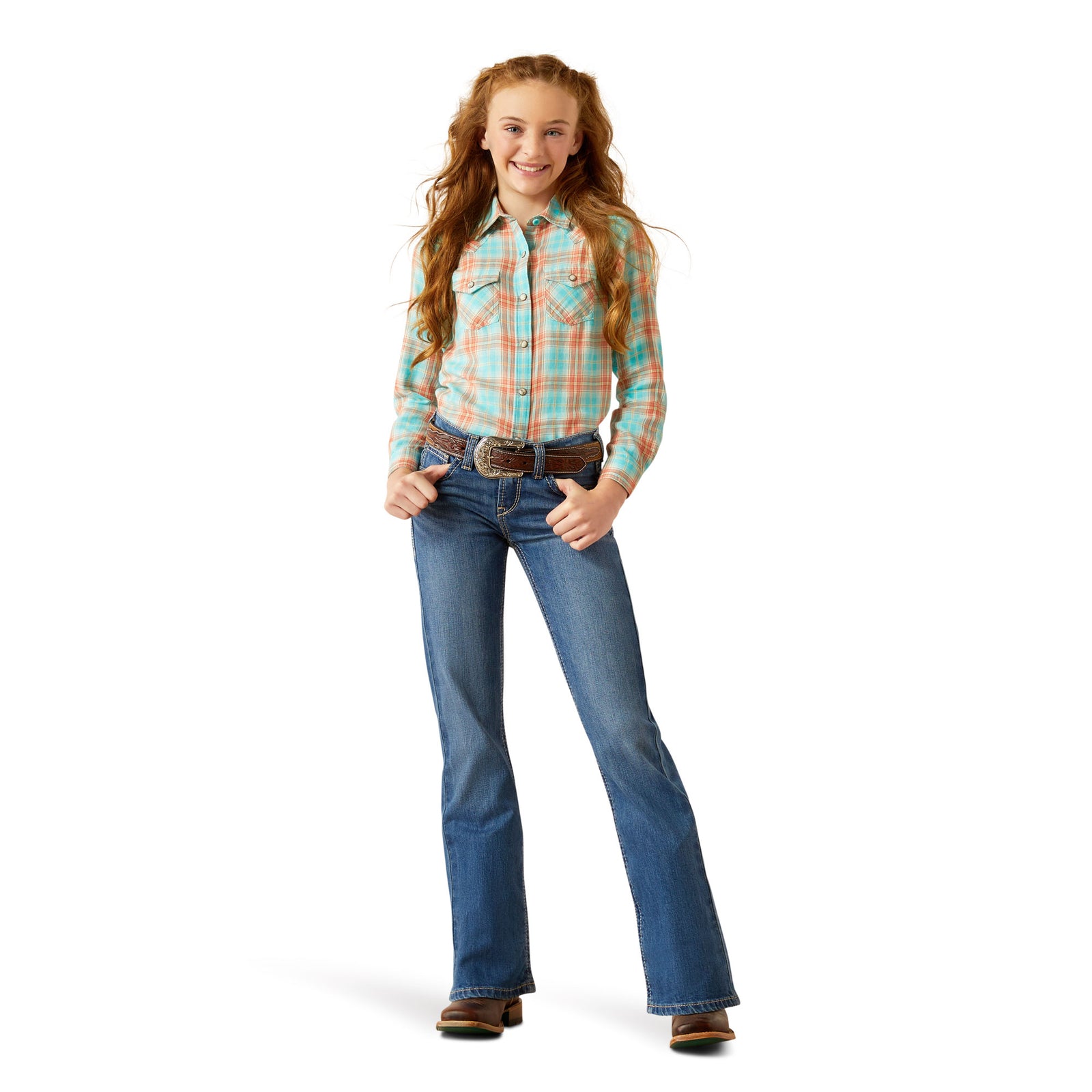 Ariat Girl's Lilla Boot Cut Jeans. Girl wearing a plaid shirt and blue jeans on a white background