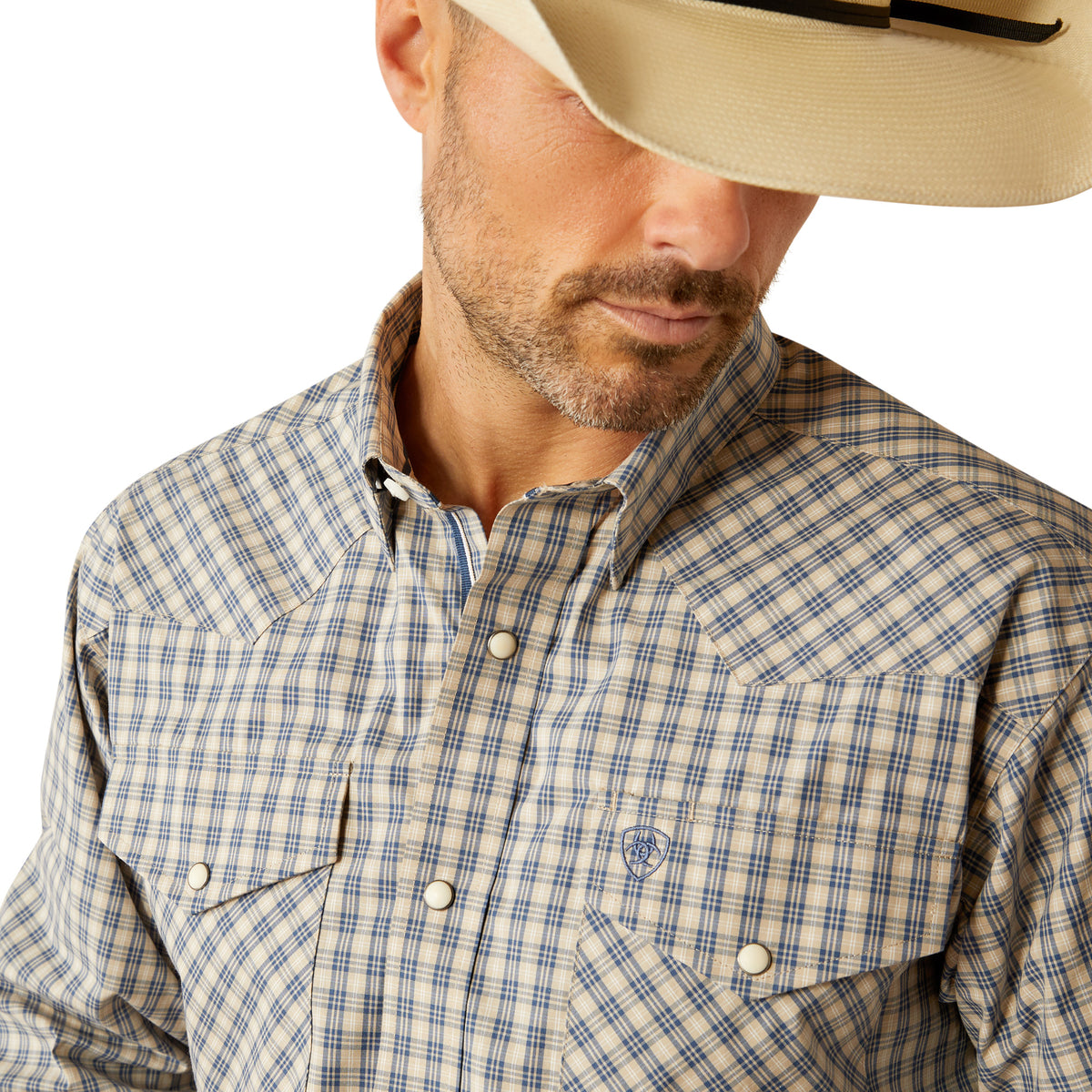 Ariat Men's Pro Series Fairbanks L/S Western Shirt. Man wearing a plaid shirt and cowboy hat on a white background