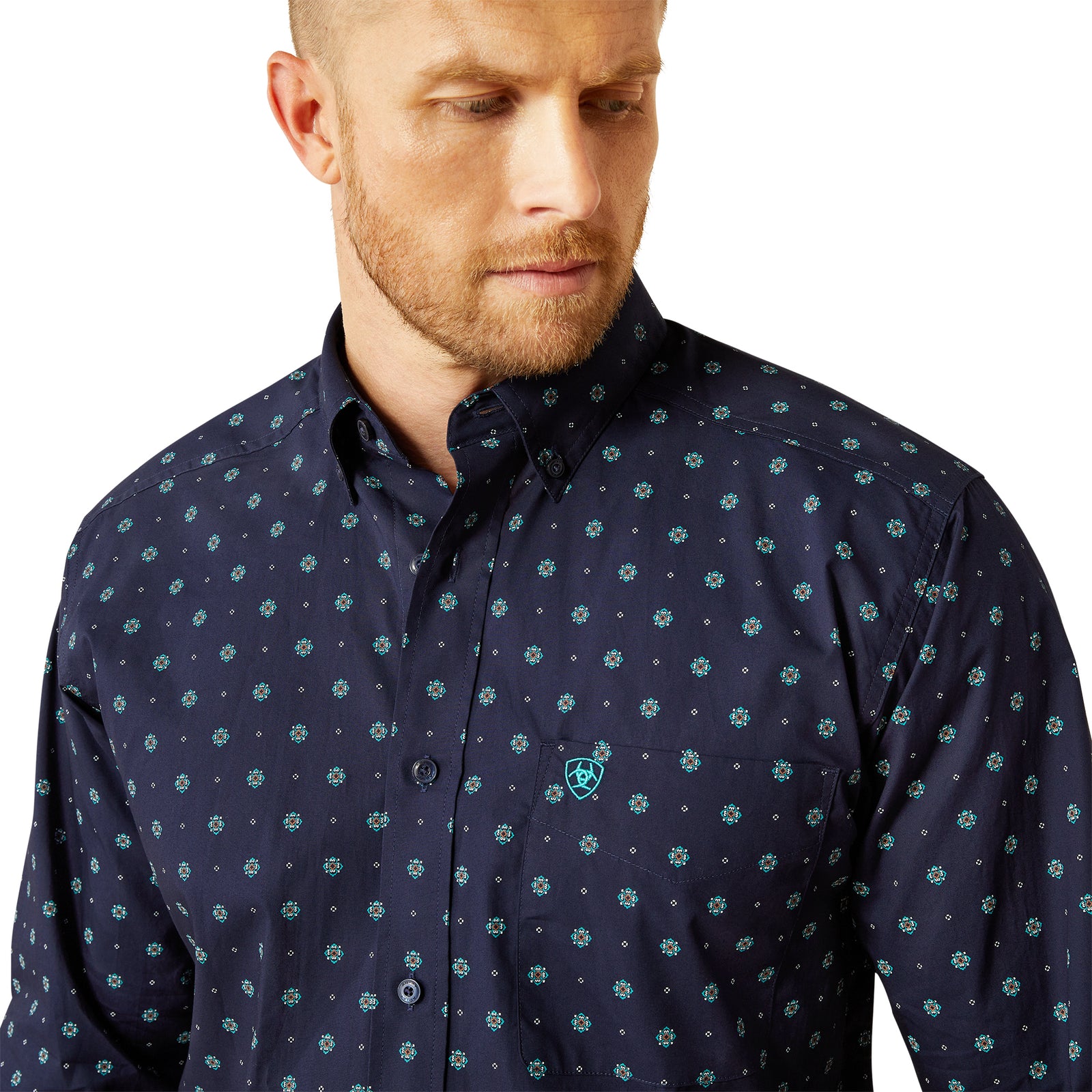 Ariat Men's Jacobi Classic Fit L/S Western Shirt. Man wearing a navy blue shirt with a subtle pattern on a white background