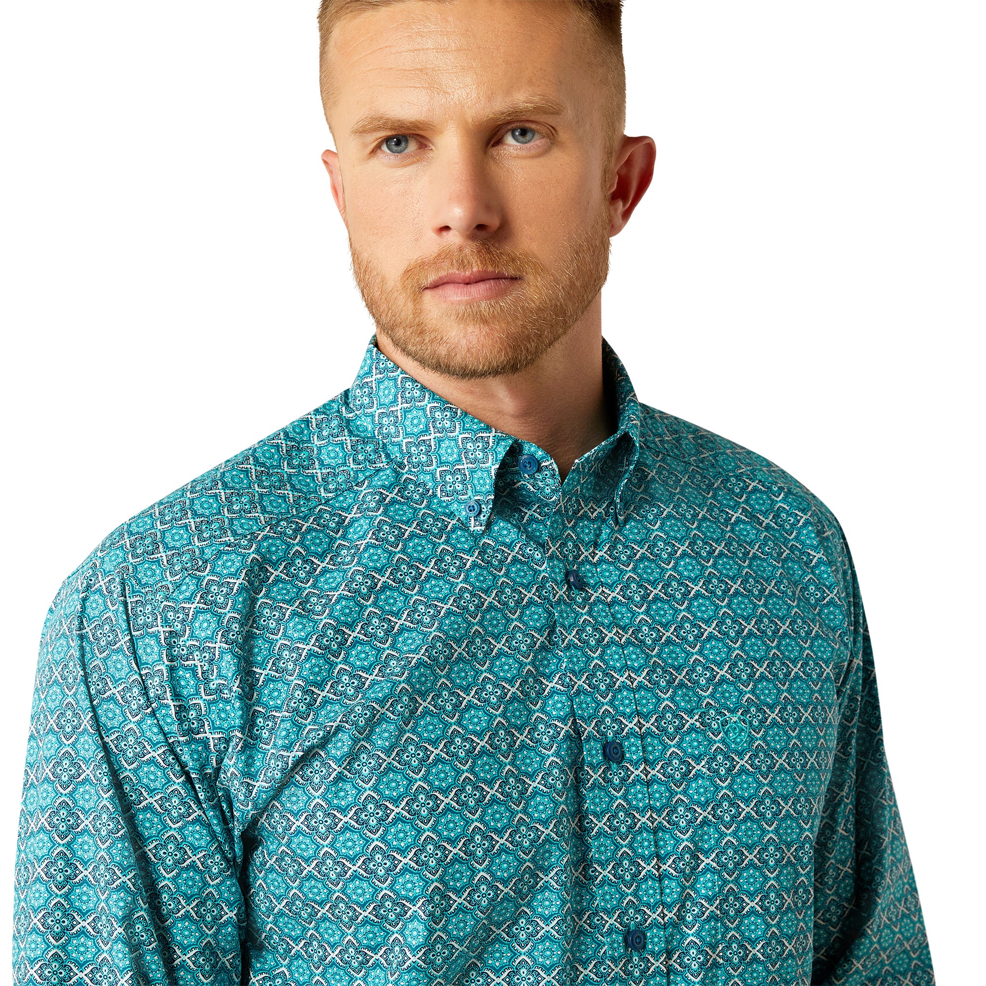 Ariat Men's Jordy Classic Fit L/S Western Shirt. Man wearing a teal patterned shirt on a white background