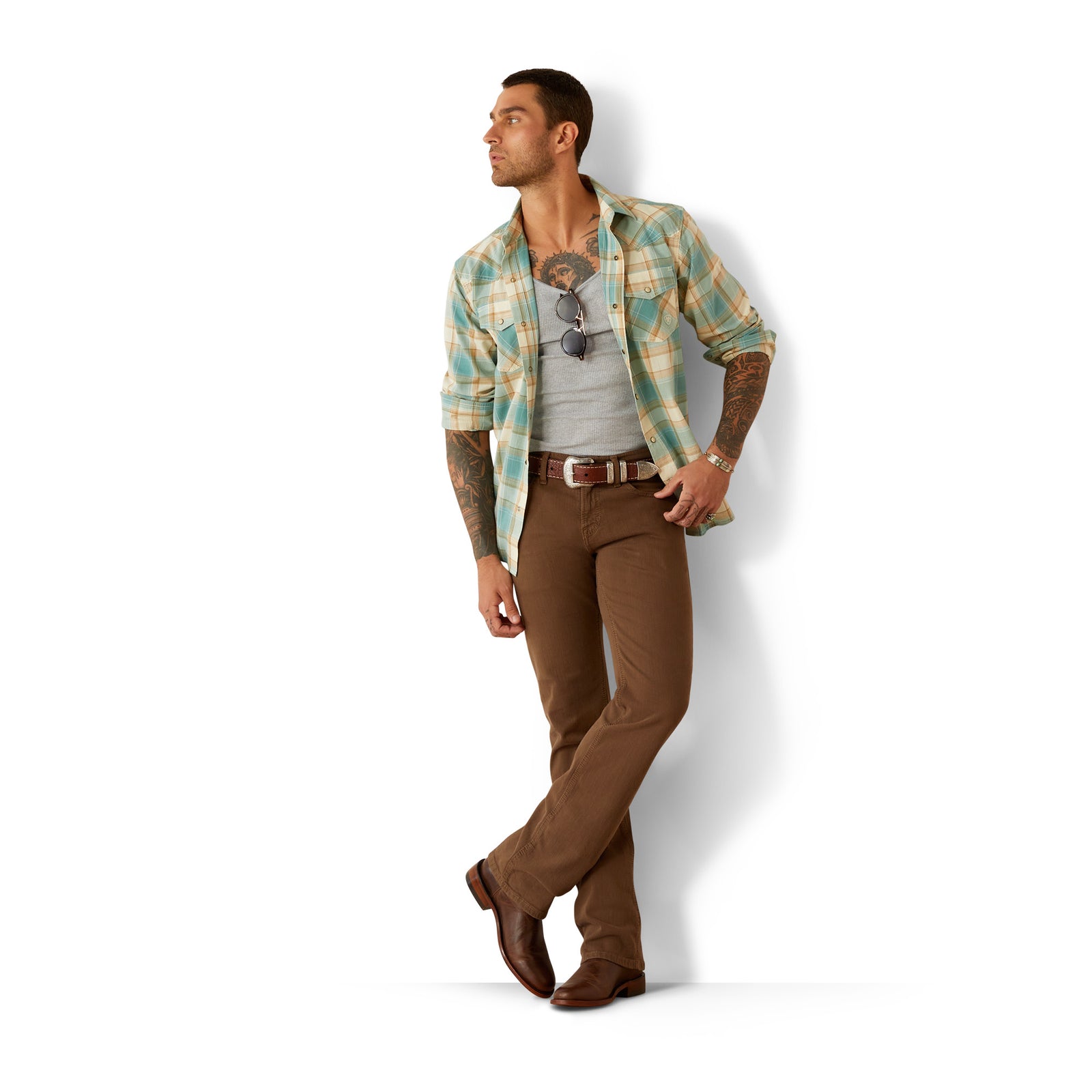Ariat Men's Hardin Retro Fit L/S Western Shirt. Man wearing a plaid shirt and brown pants on a white background