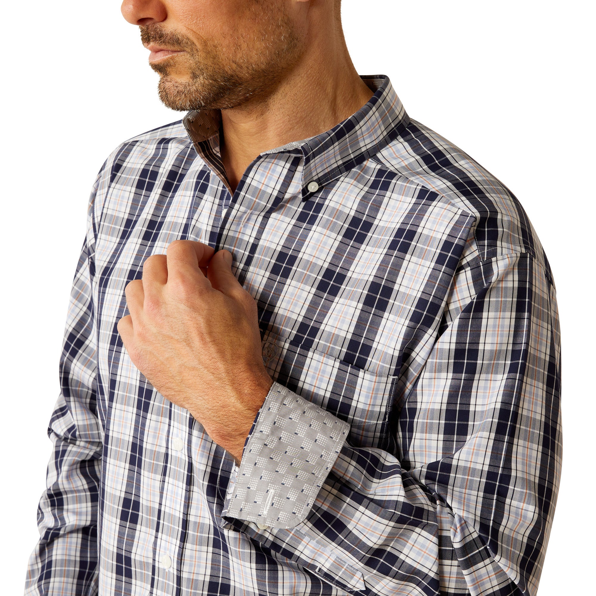 Ariat Men's Ocean Plaid Wrinkle Free L/S Western Shirt. Man wearing a plaid shirt and jeans on a white background