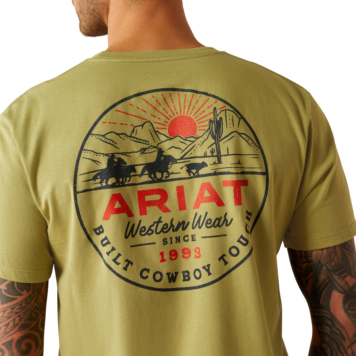 Ariat Men's Full Circle T-Shirt. Green t-shirt with a Western-themed graphic and text on the back.