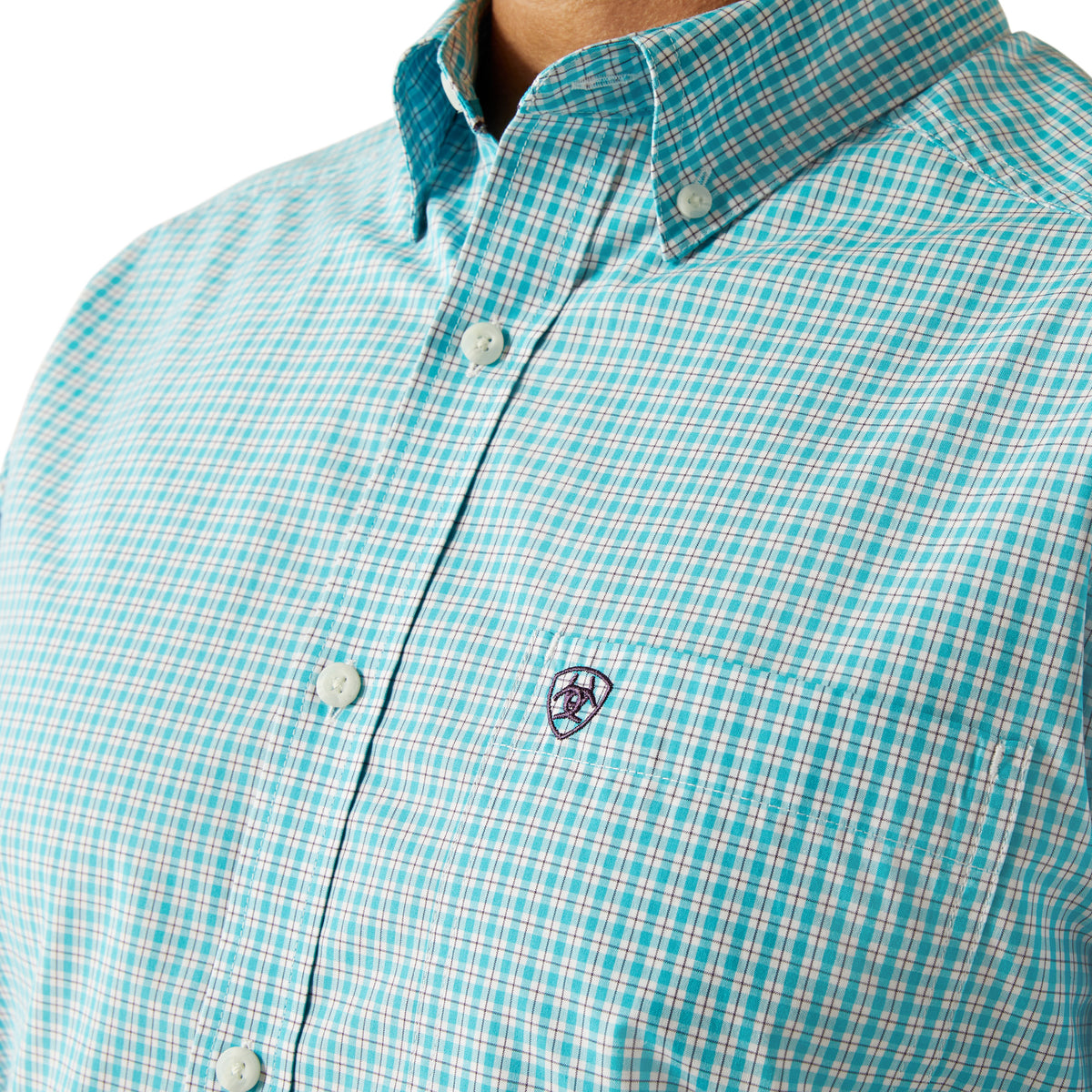 Ariat Men's Pro Series Wilmer L/S Western Shirt. Close-up of a turquoise checkered shirt with a brand logo on a white background
