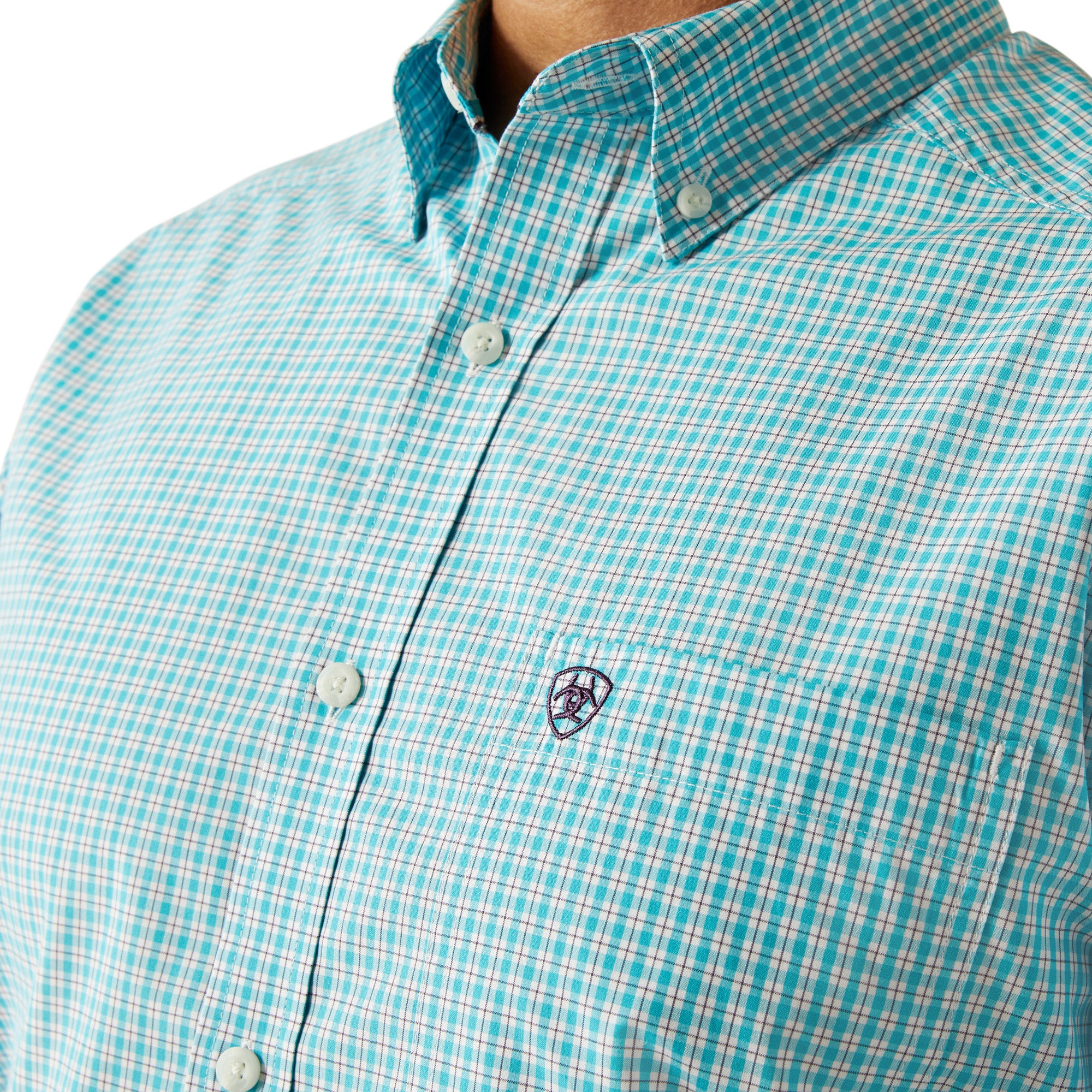 Ariat Men's Pro Series Wilmer L/S Western Shirt. Close-up of a turquoise checkered shirt with a brand logo on a white background