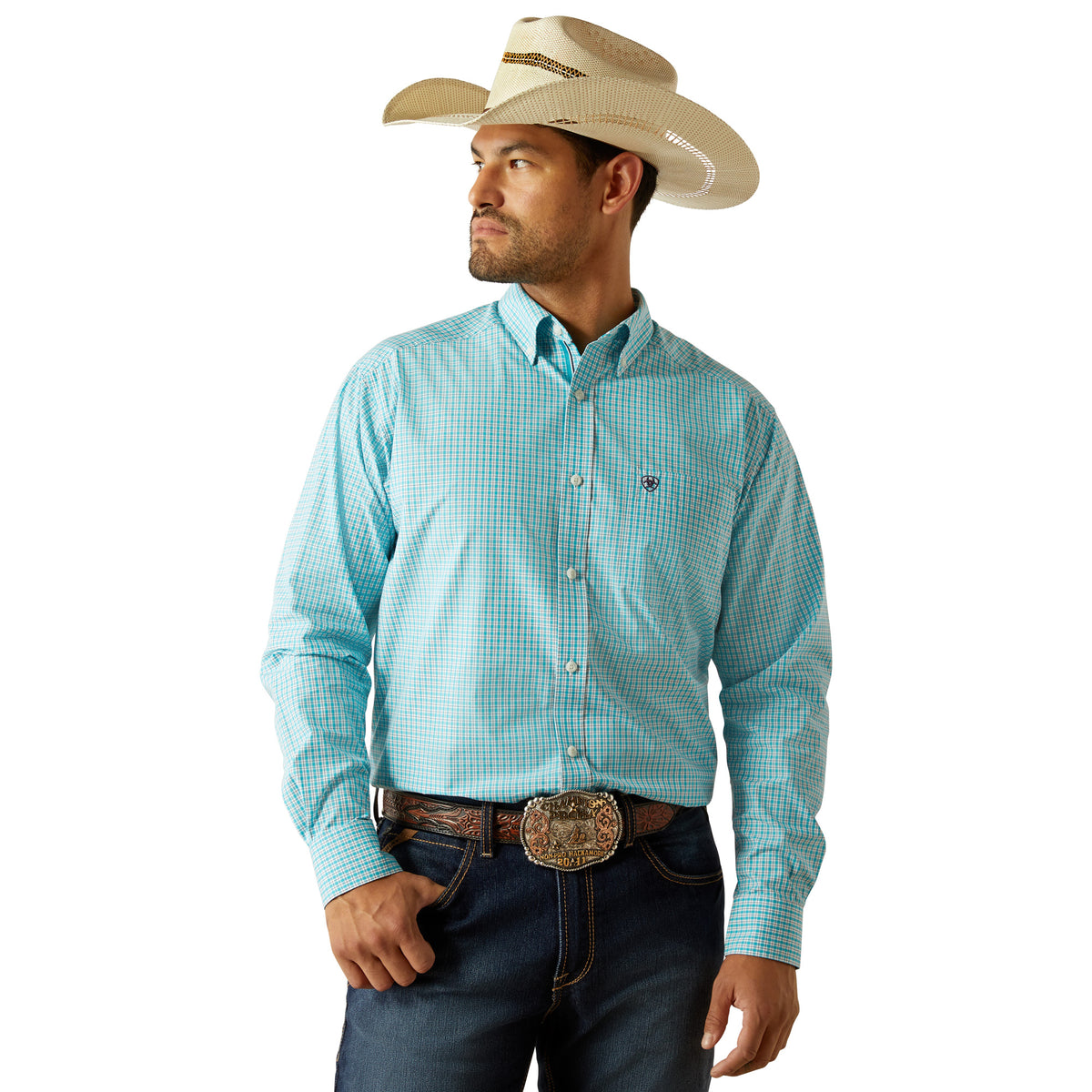 Ariat Men&#39;s Pro Series Wilmer L/S Western Shirt. Man wearing a light blue checkered shirt, dark jeans, and a straw cowboy hat on a white background