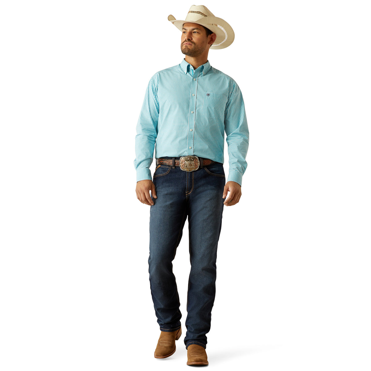 Vintage Kookas. Man wearing a light blue button-up shirt, dark jeans, brown boots, and a cowboy hat on a white background
